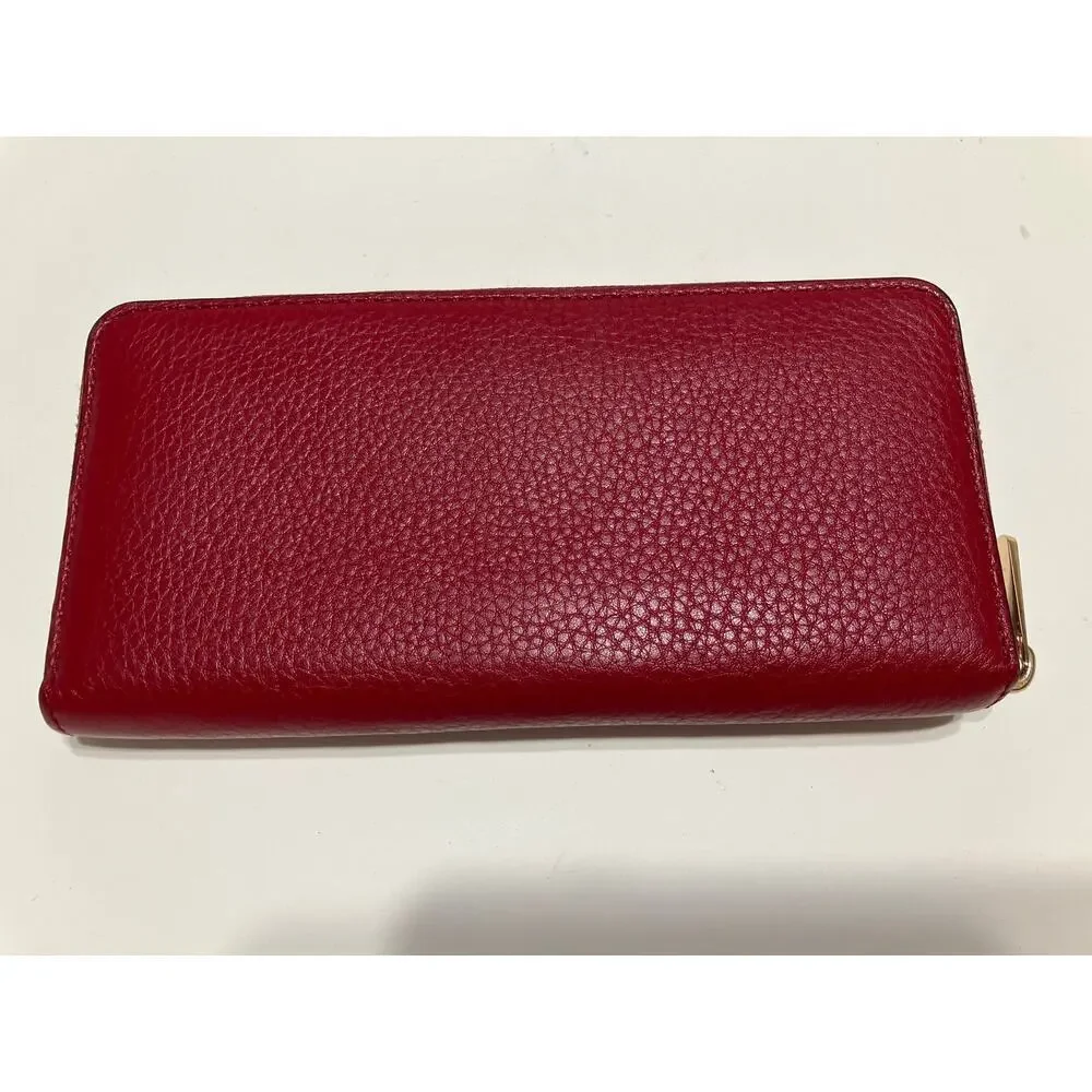MICHAEL KORS, LARGE RED PEBBLED LEATHER WALLET
